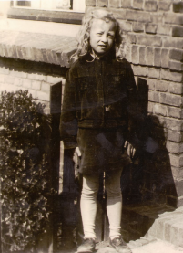 Zoetje Corvers in front of her parental home during the war.