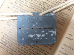 Zakboekjes en herkenningsplaatjes van het Korps Pontonniers en Torpedisten