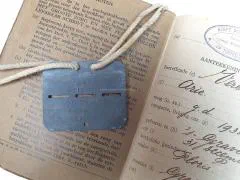 Zakboekjes en herkenningsplaatjes van het Korps Pontonniers en Torpedisten