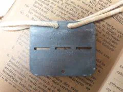 Zakboekjes en herkenningsplaatjes van het Korps Pontonniers en Torpedisten